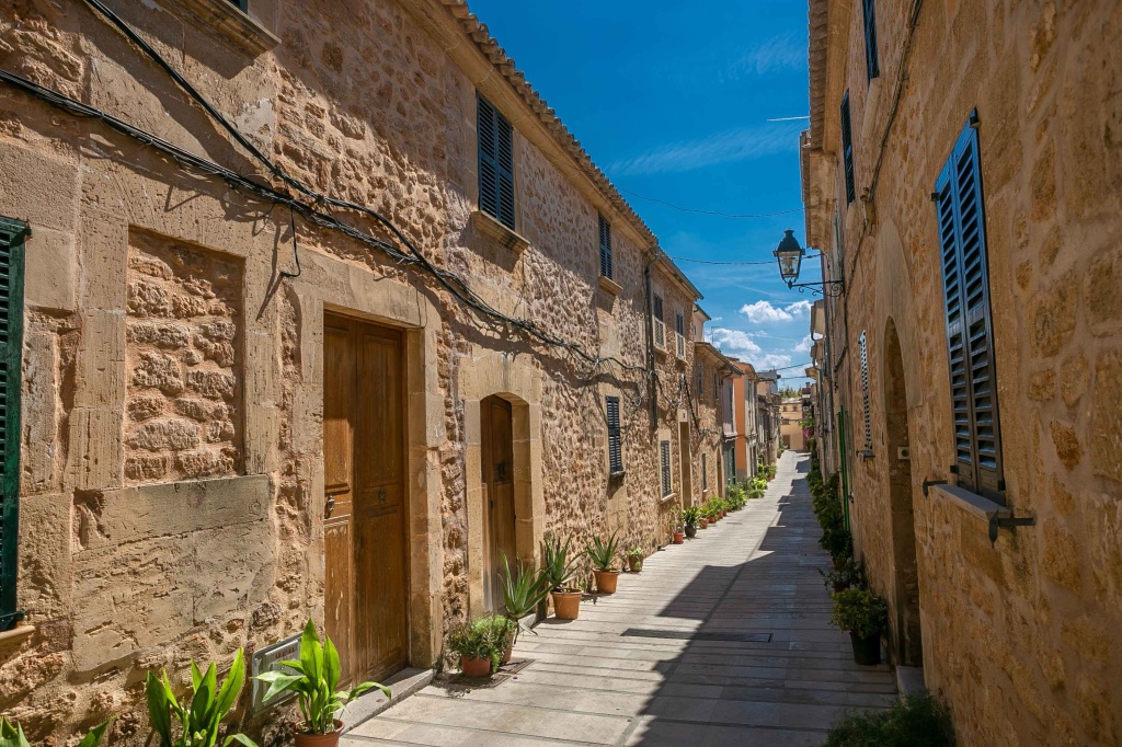 Narrow street in old town of historic Alcudia