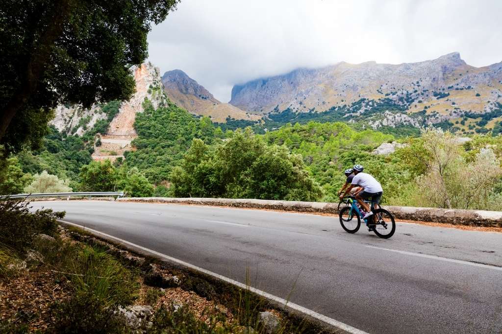 Cyclists Riding up the Puig Major Peak in Majorca