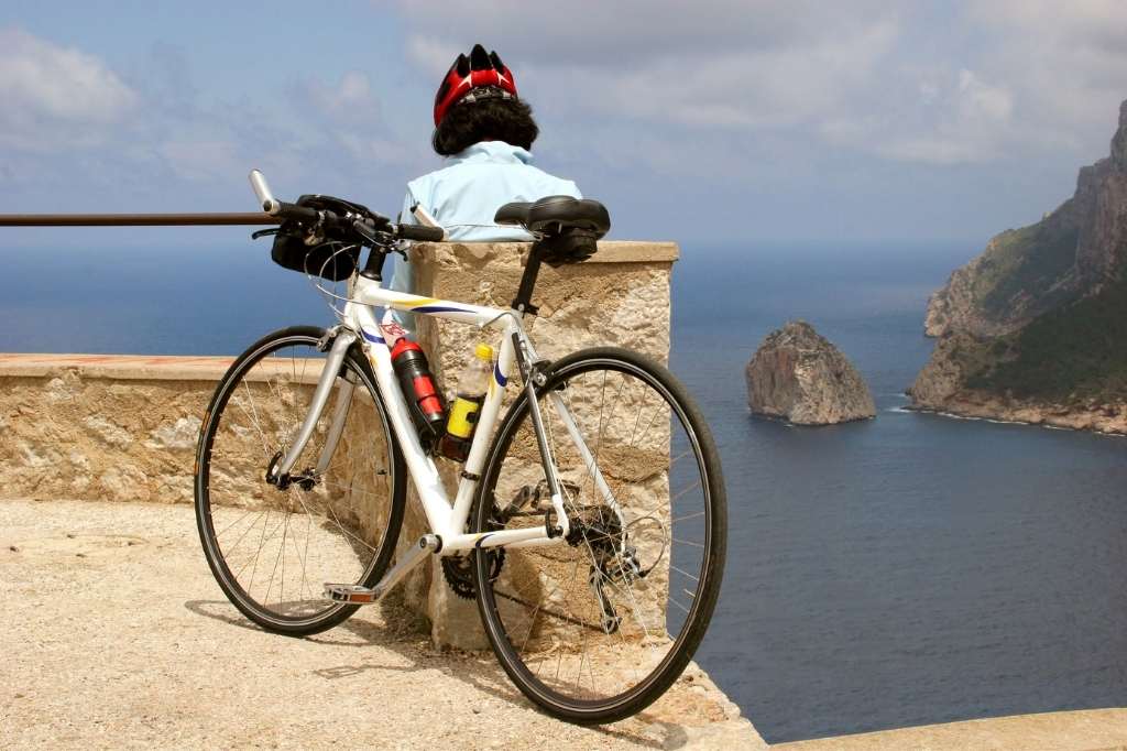 Biker siesta at Cabo Formentor, Mallorca, Spain
