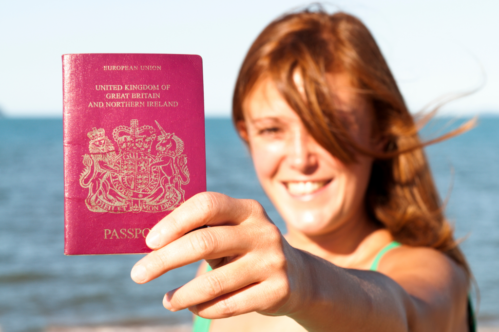 girl showing British passport