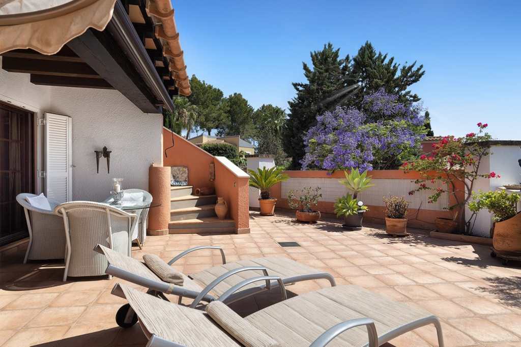 Sunny terrace of a villa in Las Abubillas Residential Complex