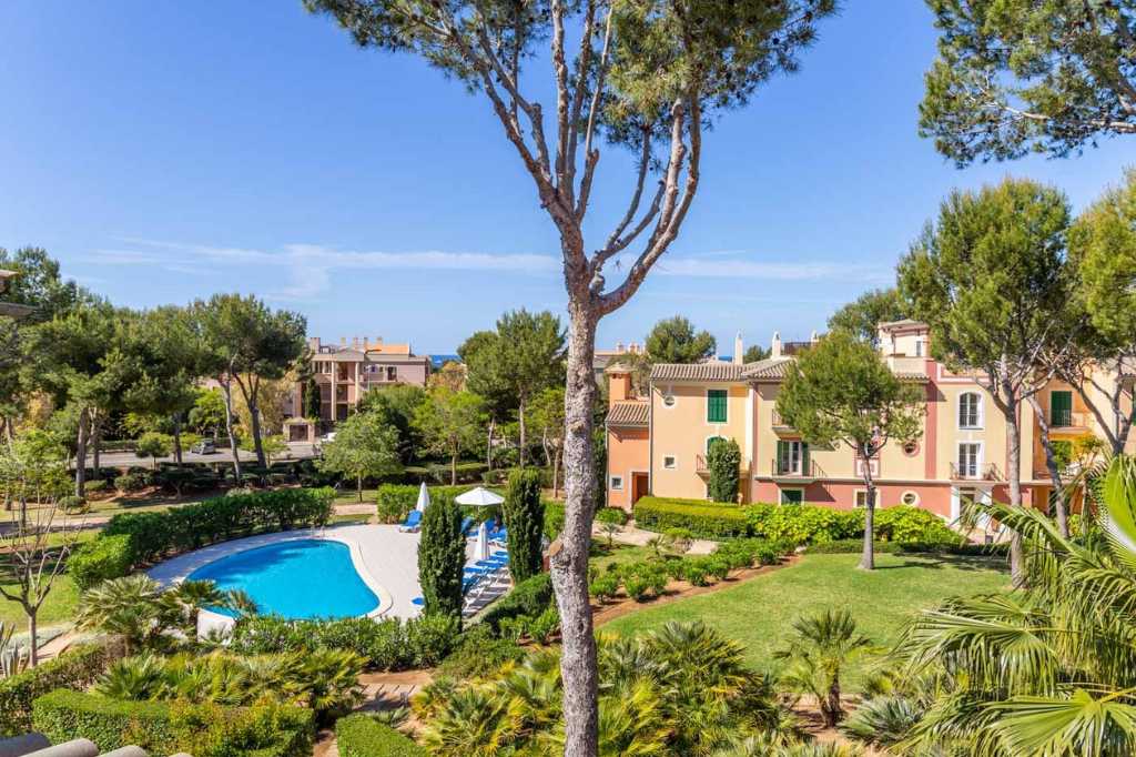 well-kept Mediterranean garden on the territory of the Las Adelfas residential complex