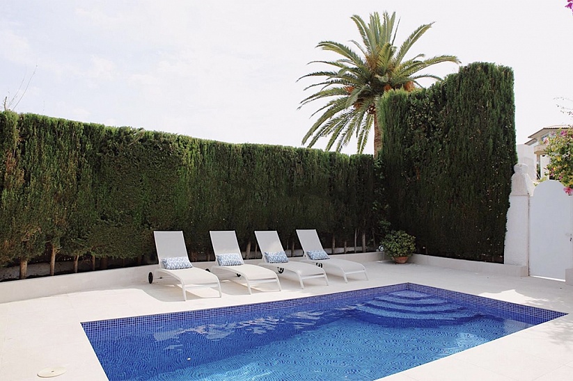 Beautiful semi-detached house with garden and pool in Sol de Mallorca.