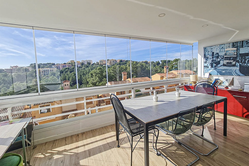 Bright apartment with direct sea views in a gated community in Cas Catala
